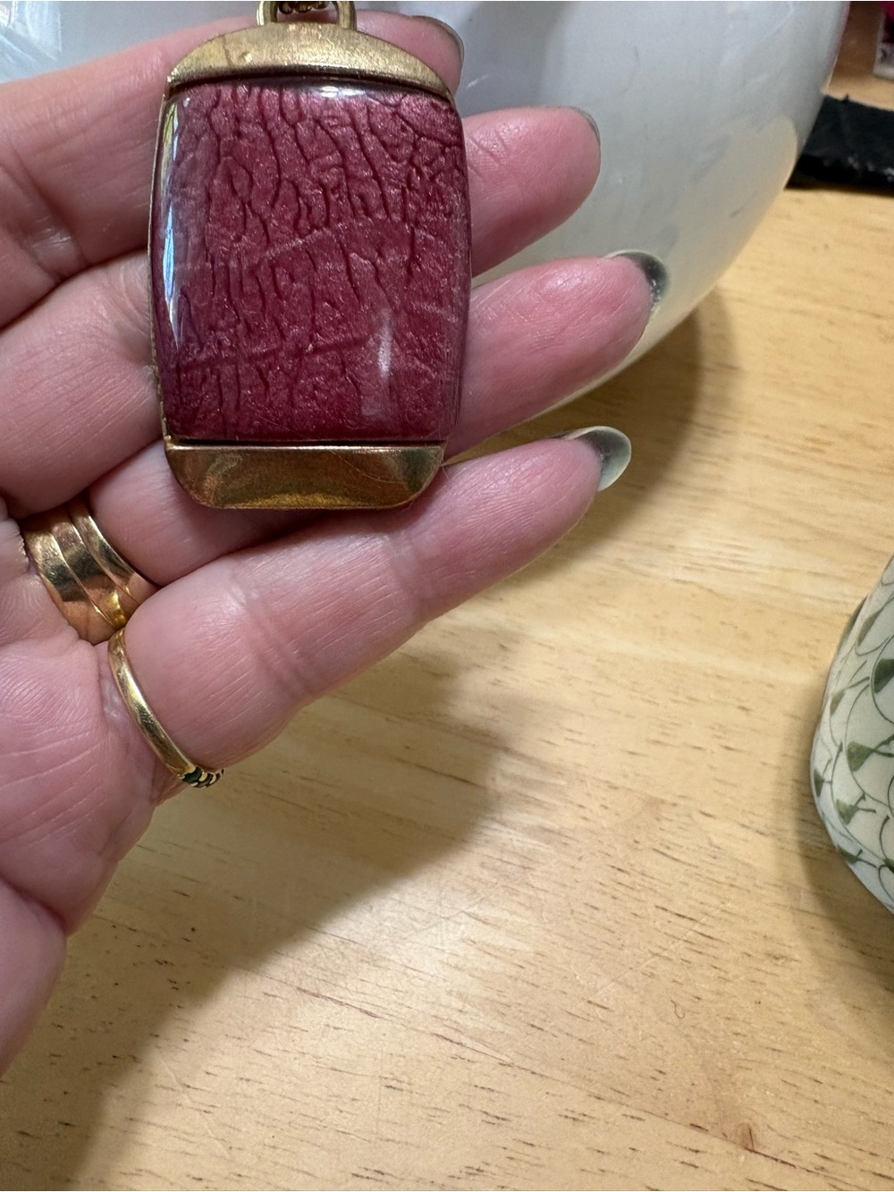 N234 Gold-Tone Pendant Necklace with Textured Wine Red Inlay